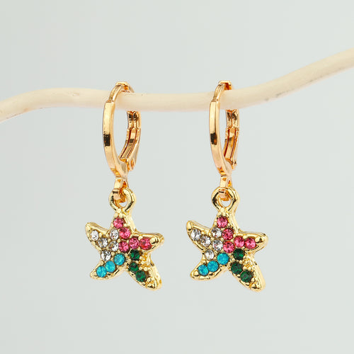 Close-up showing the colors and surface details of gold Tone Multicolor Crystal Sea Animal Huggie Drop Earrings