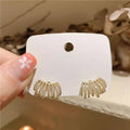 Crystal Fan Stud Earrings in Gold and Silver Tones view 6
