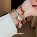 Sixteen Mixed Enamel Metal And Fuzzy Leopard Bracelet Styles view 2
