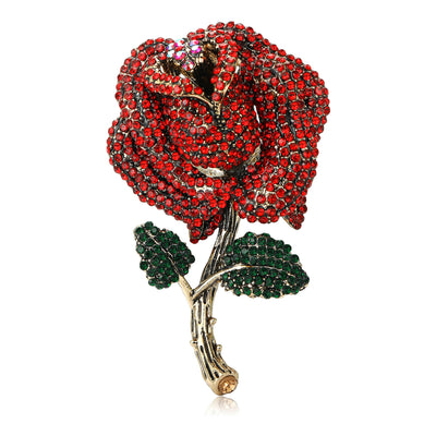 Front view of crystal rose stem brooch with green leaves decorative metal pin