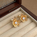 Gold Hammered Double Flower Stud Earrings Clear Crystal Centers view 4