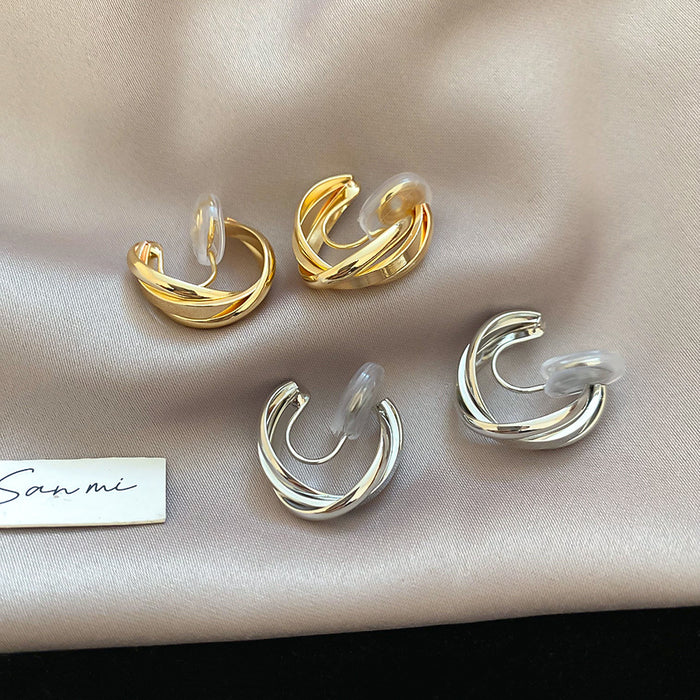 Interlocking Double Hoop Clip On Earrings in Gold and Silver