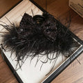 Large Black Feather Hair Claw With Sequin Bow And Loose Strands view 6