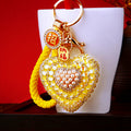Cat Eye Heart Keychains in Eight Colors with Fortune Loop Options view 3
