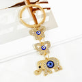 Gold Rhinestone Evil Eye Keychain With Butterfly And Hamsa Charm view 4