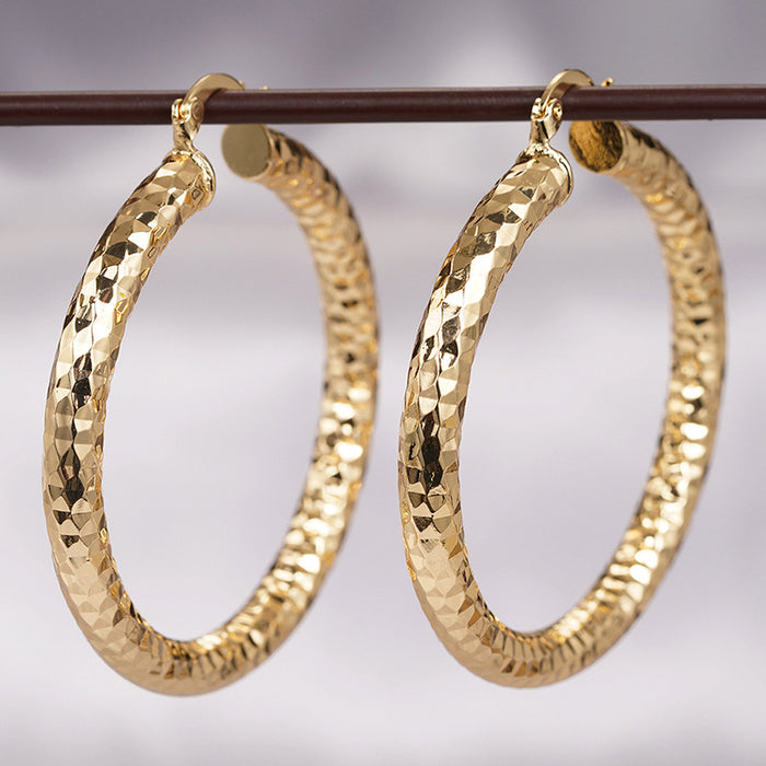 Gold Tone Large Faceted Hammered Texture Hoop Earrings