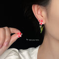 Gold Tone Blue And Pink Flower Asymmetric Stem Stud Earrings view 3