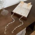 Gold Tone Floral Hair Clip With Pearl And Chain Drapes view 6