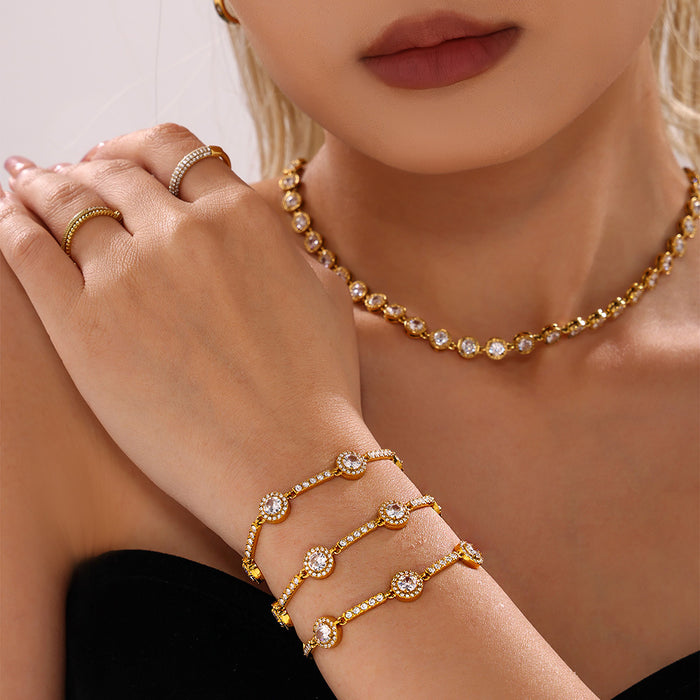Round Halo Zircon Station Bracelet Gold and Steel Tones