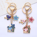 Gold-Tone Enamel House Charm Keychain with Mushroom and Flower view 4