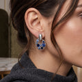 Blue Faceted Stone Open Oval Silver Tone Dangle Earrings view 1