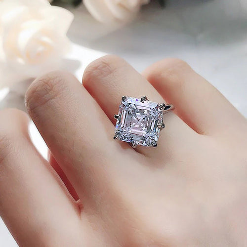 Second product view showing silver-tone oversized square clear solitaire ring