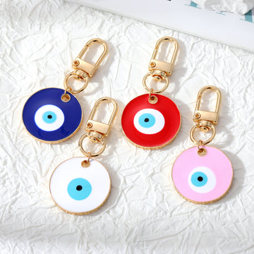 Gold Tone Oversized Round Evil Eye Clip Keychains in Two Colors