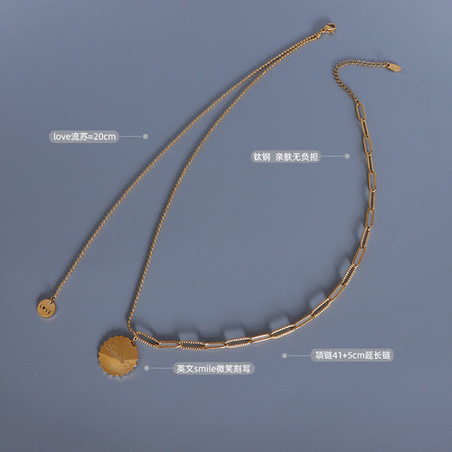 Gold double necklace flat lay with titanium steel length and engraving labels