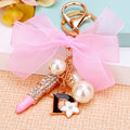 Chiffon Bow Lipstick Keychains in Pink and Fuchsia with Pearl Accents view 2