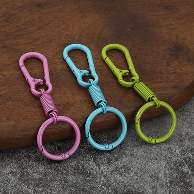 Pink, sky-blue and light-green carabiner key rings