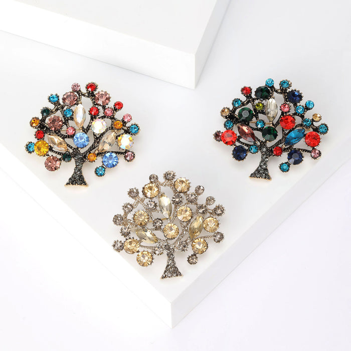 Colorful Crystal Tree Brooch with Polished Metal and Decorative Accents