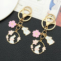 Thirteen Pink Rabbit Blossom Wreath Metal Keychain Designs view 3