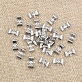 Small Bow Stainless Steel Connectors in a Silver Tone view 3