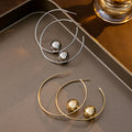 Gold and Silver Oversized Ball Tip Open C Hoop Earrings view 1
