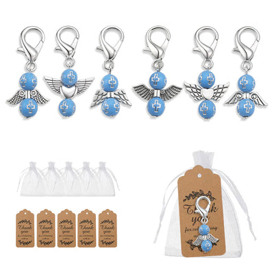 Six blue cross-bead angel charms displayed with white organza bags and brown thank-you tags.
