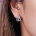 Silver Tone Triple Row Pave Triangle Geometric Huggie Earrings view 1