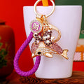 Gold Tone Crystal Bow Dolphin Keychains in Three Colors view 6