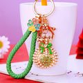 Pearl Pouch Keychains with Four-Leaf Caps and Braided Wrist Straps view 9