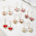 Gold Tone Heart-Shaped Pressed Flower Drop Earrings in Six Designs view 1