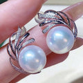 White Gold Banana Leaf Faux Pearl Stud Earrings Pair view 1