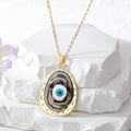 Gold Tone Oval Resin Evil Eye Pendant Necklaces in Six Colors view 9