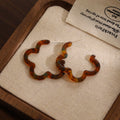 Blue Brown Amber and Cream Wavy Flower Shaped Hoop Earrings view 3