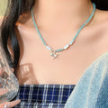 Blue Beaded Necklace with Fish and Starfish Charms view 5