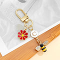 Gold Tone Initial Letter Charm Keychain with Enamel Daisy and Rhinestone Bee view 6