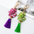 Openwork Chinese Dragon Character Tassel Keychains in Purple Green and Assorted Colors view 2