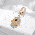Gold and Silver Tone Crystal Hamsa Evil Eye Clip Keychains view 2