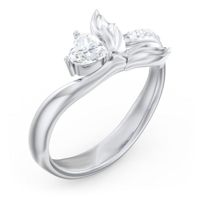 Silver mermaid tail ring with clear heart CZ on white background