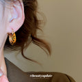 Gold Tone Leopard Print Round Huggie Hoop Earrings view 4