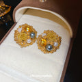Gold Tone Round Floral Stud Earrings With Pearl Like Accents view 4