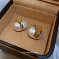 Gold Sculpted Hoop White Pearl Earrings Polished Metal Jewelry view 4