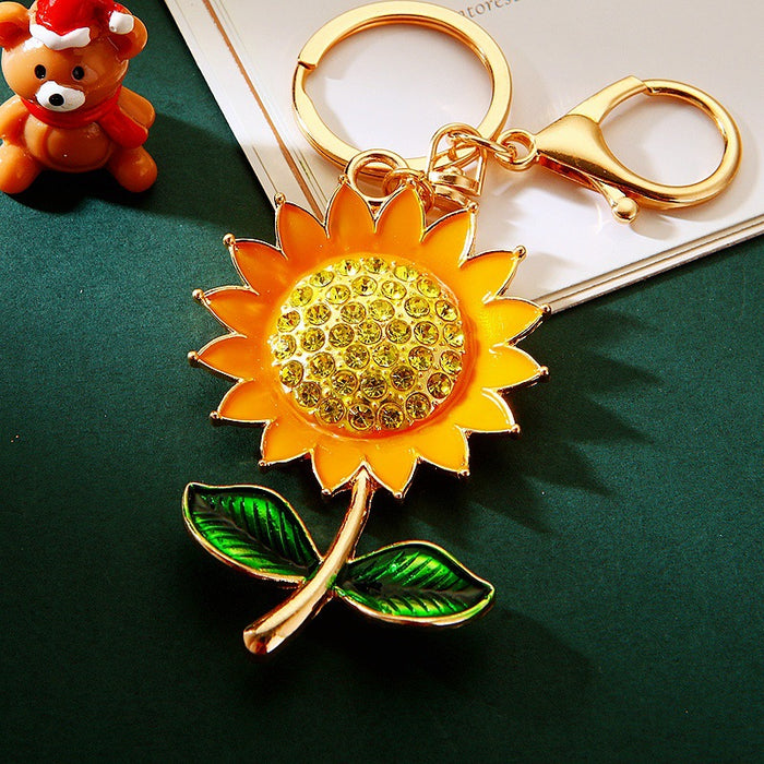 Crystal Center Sunflower Keychain With Green Enamel Leaves
