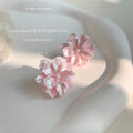 Pink Pearlescent Camellia Flower Stud Earrings Pair view 1
