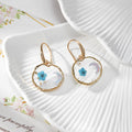 Gold Tone Moon and Butterfly Pressed Flower Huggie Earrings in Eight Designs view 7