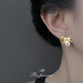 Gold-Tone Ribbed Bow Pearl Oval Clear Stone Stud Earrings view 2