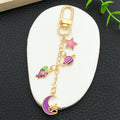 Six Purple and Blue Celestial Metal Clasp Keychain Designs view 4
