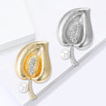 Calla Lily Brooch In Metal With Textured Metal Petals, A Crystal Center, And A Hanging view 3