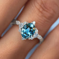 Aqua Oval Floral Cluster Three-Stone Ring In Two Metal Tones view 2