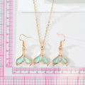 Gold Tone Aqua Glitter Mermaid Tail Necklace and Hook Earrings view 2
