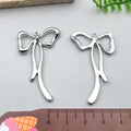 Silver-Tone Bow and Butterfly Metal Charms with 18 Listed Options view 10