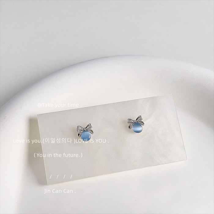 Silver Tone Bow And Blue Gray Round Cabochon Stud Earrings
